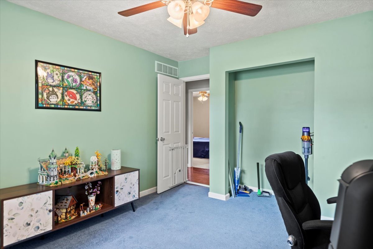 15 Mesa Road Springfield, IL 62702 - Photo 22 of 42 a workspace room with furniture and a window