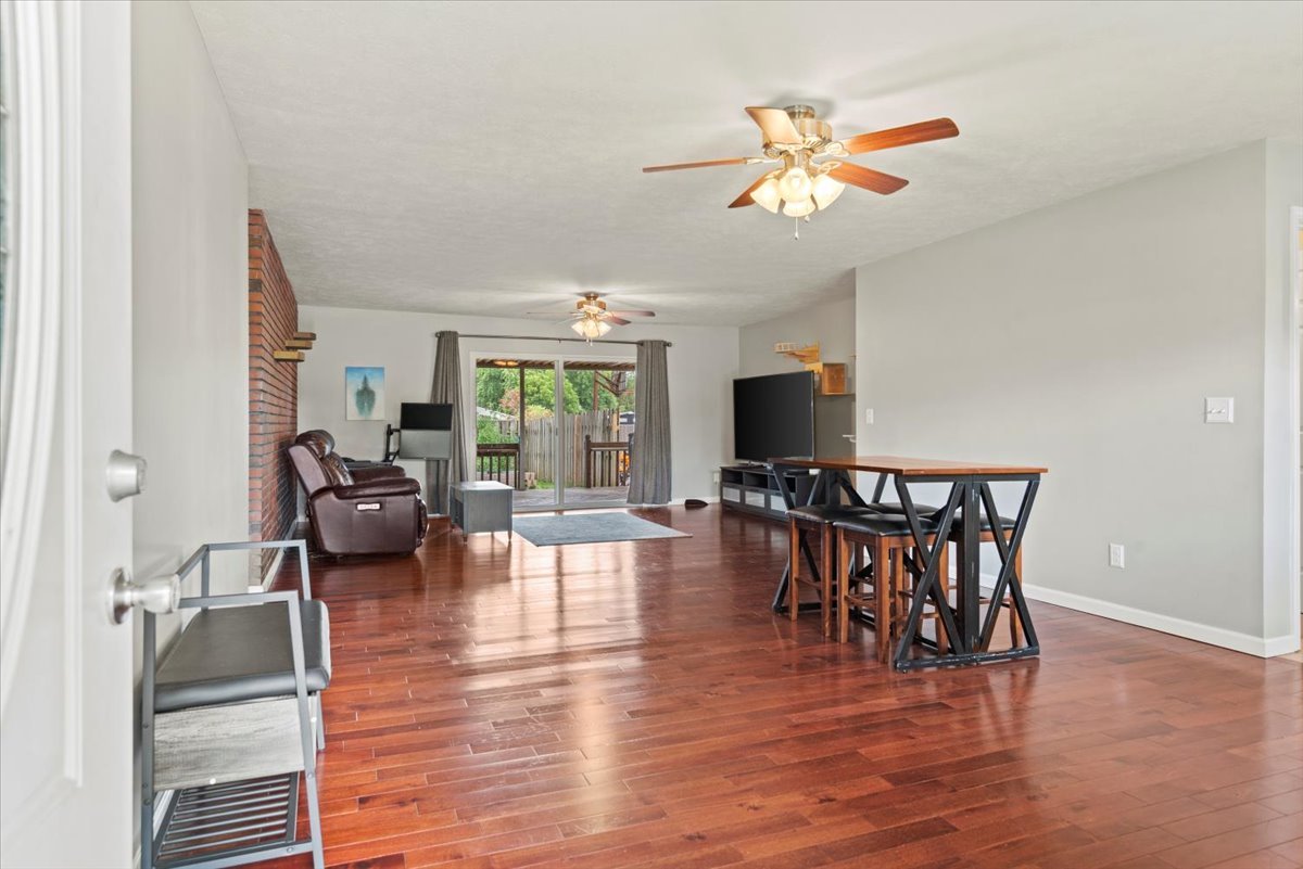 15 Mesa Road Springfield, IL 62702 - Photo 5 of 42 a view of a dining room with furniture window and wooden floor