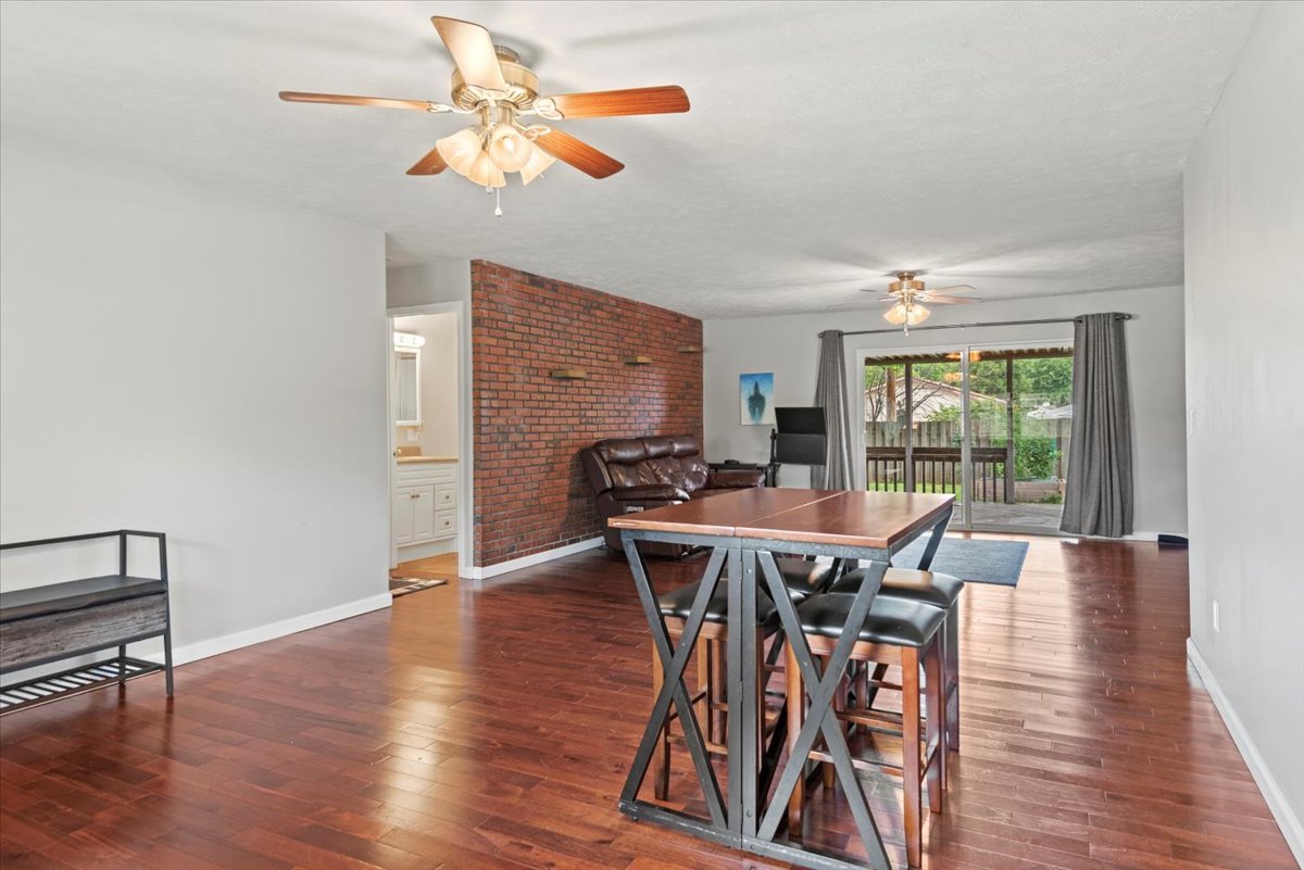 15 Mesa Road Springfield, IL 62702 - Photo 7 of 42 a view of a dining room with furniture window and wooden floor