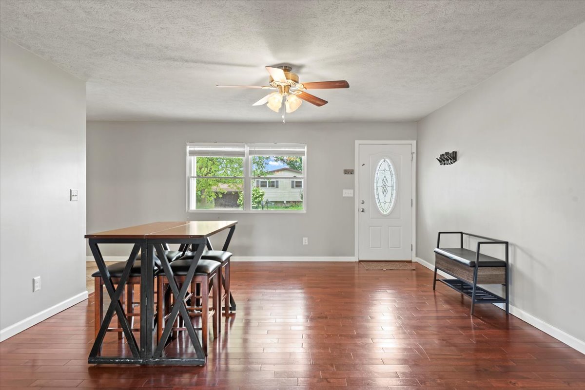 15 Mesa Road Springfield, IL 62702 - Photo 8 of 42 a view of a dining room with furniture and wooden floor