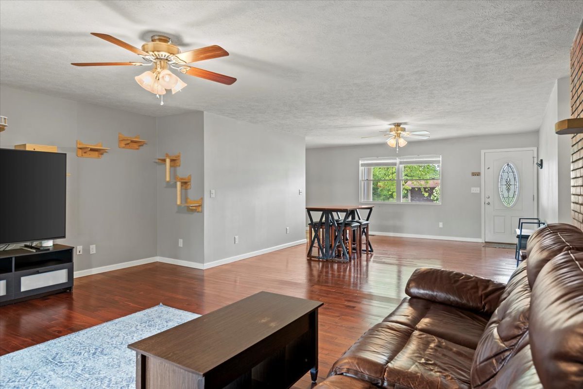 15 Mesa Road Springfield, IL 62702 - Photo 10 of 42 a living room with furniture and a wooden floor