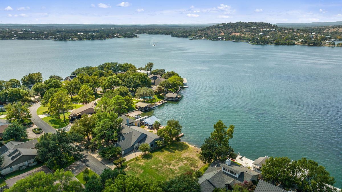 30 Beaver Island Road Granite Shoals, TX 78654 - Photo 11 of 22 a view of a lake with a mountain in the background