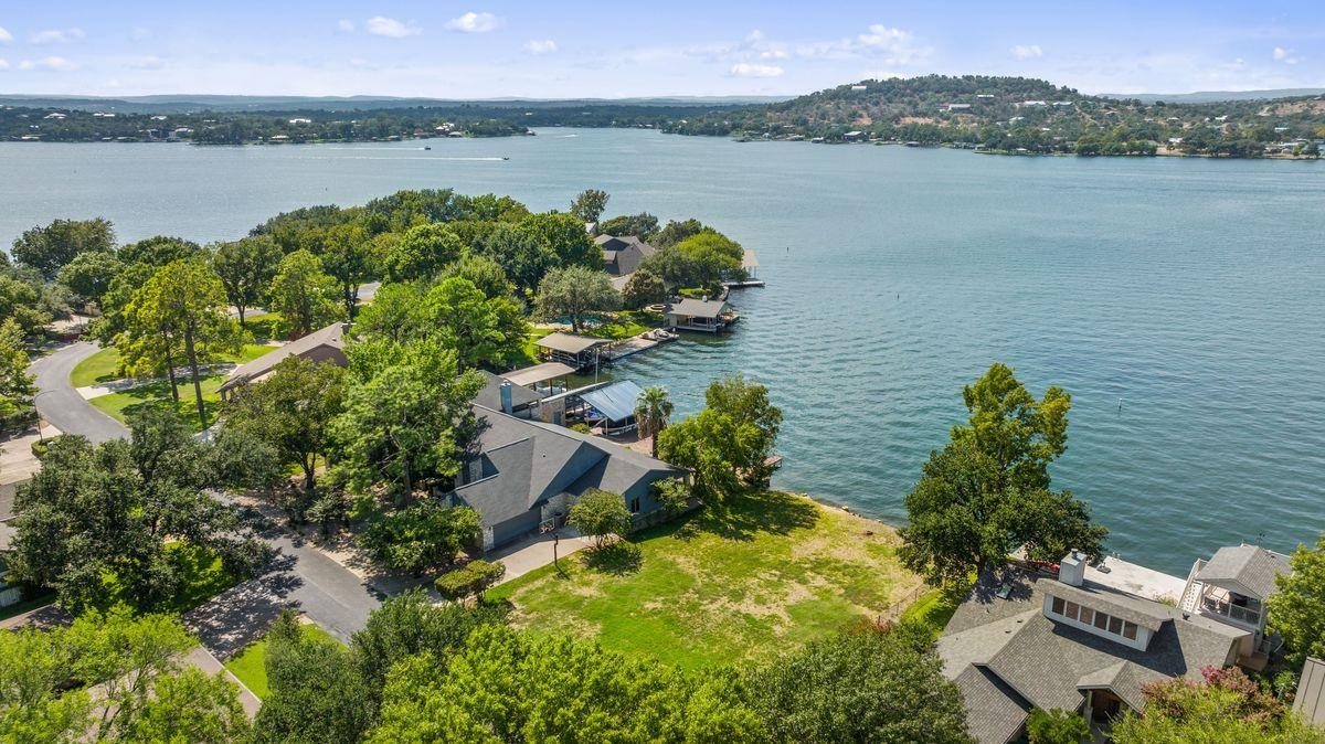 30 Beaver Island Road Granite Shoals, TX 78654 - Photo 17 of 22 a view of a lake with a mountain in the background