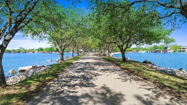 a view of a road with a yard