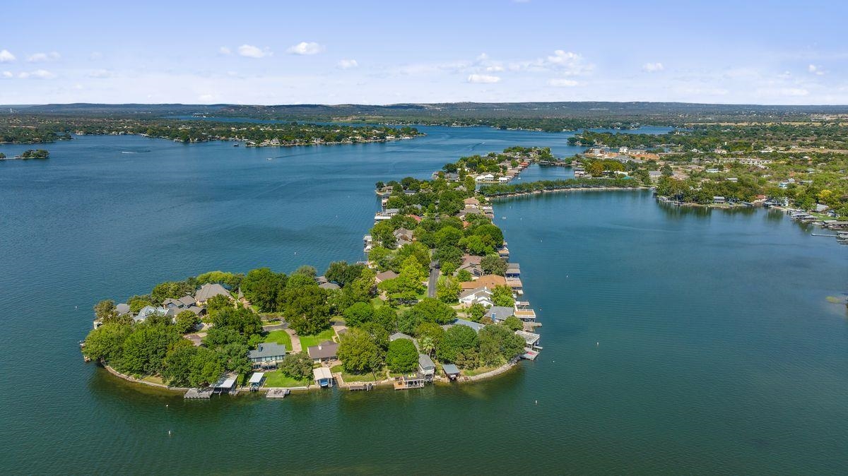 30 Beaver Island Road Granite Shoals, TX 78654 - Photo 8 of 22 a view of a lake with a mountain in the background