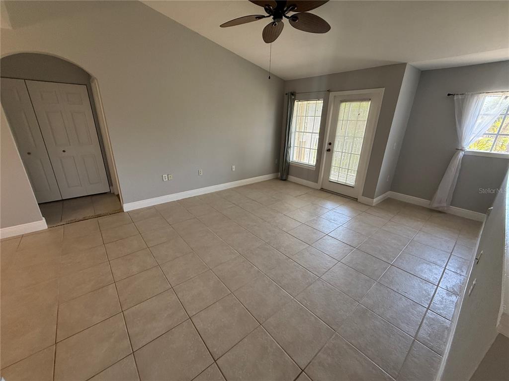 8932 Manor Loop, Unit 205 Lakewood Ranch, FL 34202 - Photo 4 of 15 a view of an empty room with a window