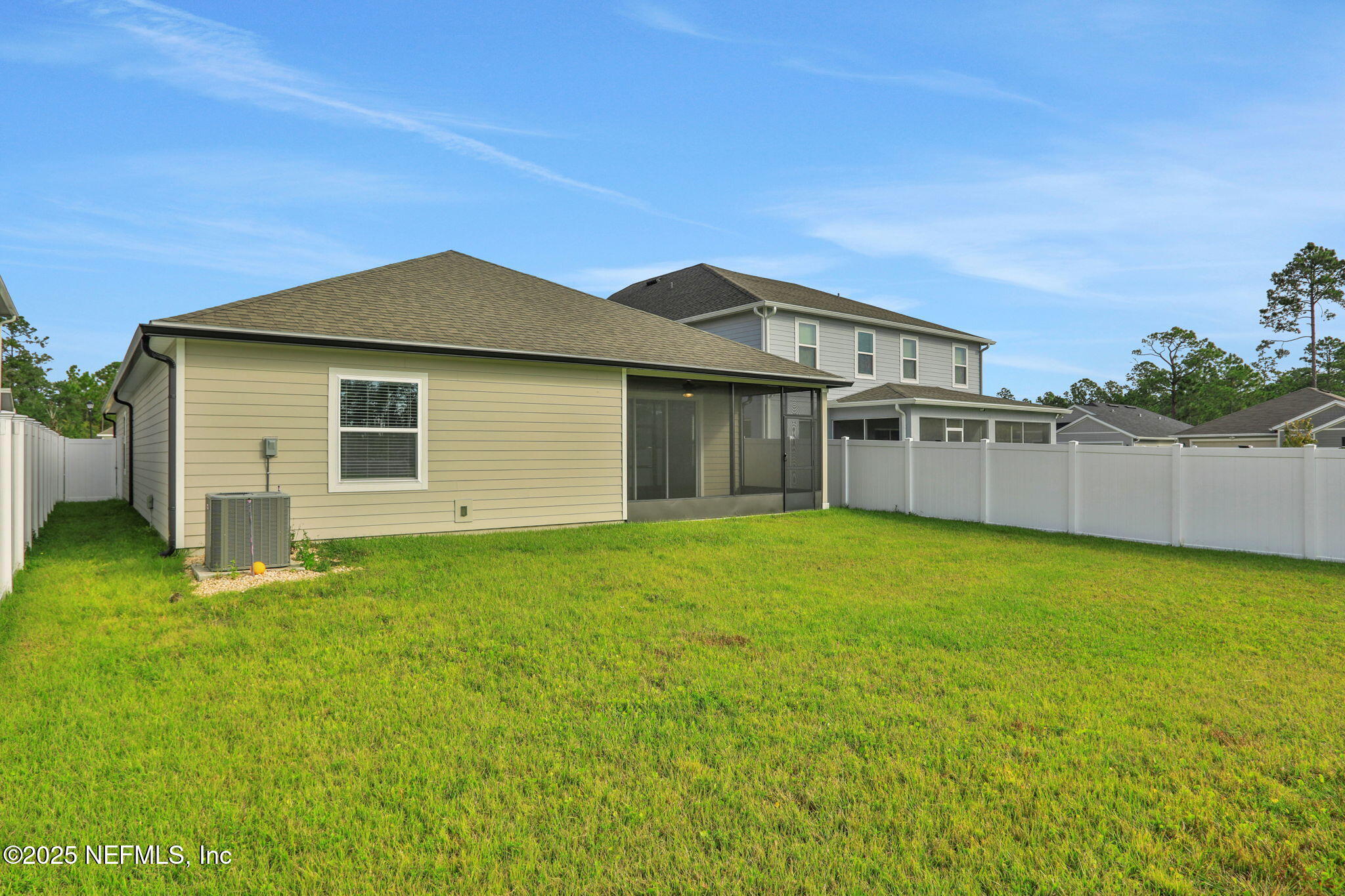 3209 Crocus Ln Green Cove Springs Green Cove Springs, FL 32043 - Photo 34 of 35 a view of a house with a backyard