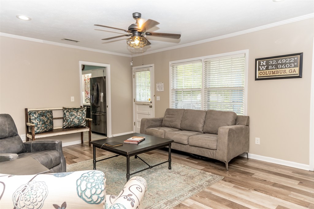 6534 Natha Avenue Columbus, GA 31909 - Photo 5 of 13 a living room with furniture and a large window