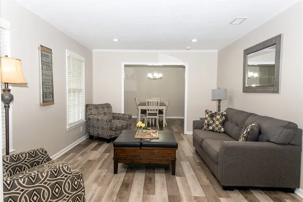 a living room with furniture and a couch