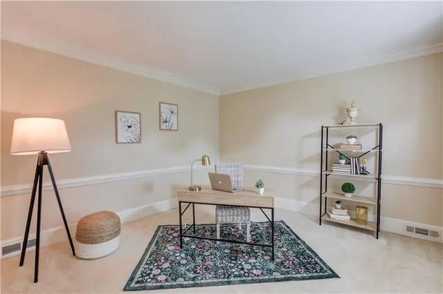 a view of a a dining room with furniture window and wooden floor