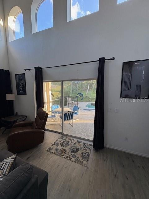 8410 Secret Key Cove Kissimmee, FL 34747 - Photo 12 of 41 a living room with furniture and a large window