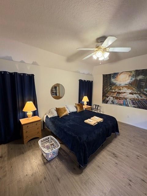 8410 Secret Key Cove Kissimmee, FL 34747 - Photo 13 of 41 a living room with furniture and a chandelier