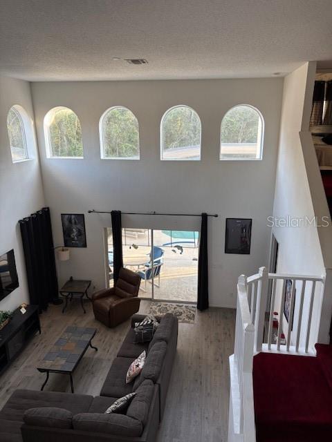 8410 Secret Key Cove Kissimmee, FL 34747 - Photo 23 of 41 a living room with couches floor and a flat screen tv