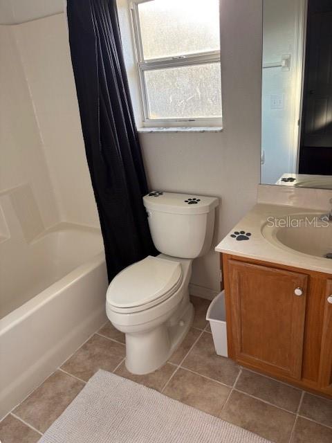 8410 Secret Key Cove Kissimmee, FL 34747 - Photo 27 of 41 a bathroom with a toilet a sink and a bathtub