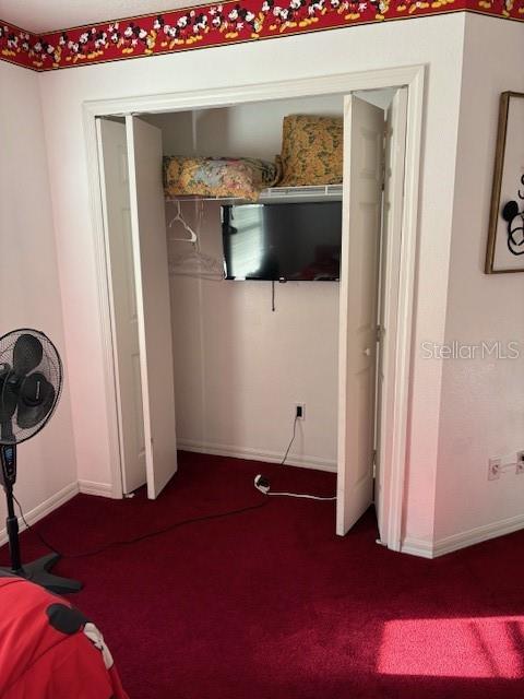 8410 Secret Key Cove Kissimmee, FL 34747 - Photo 29 of 41 a view of a livingroom with wooden floor and cabinet