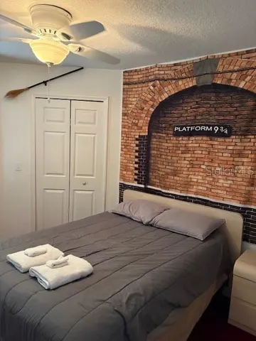 a bathroom with a sink and a picture on the wall