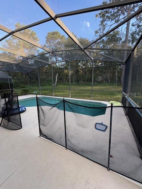 8410 Secret Key Cove Kissimmee, FL 34747 - Photo 41 of 41 a view of swimming pool with a patio and a backyard