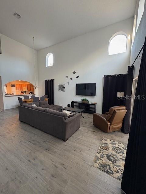 8410 Secret Key Cove Kissimmee, FL 34747 - Photo 9 of 41 a living room with furniture and a flat screen tv