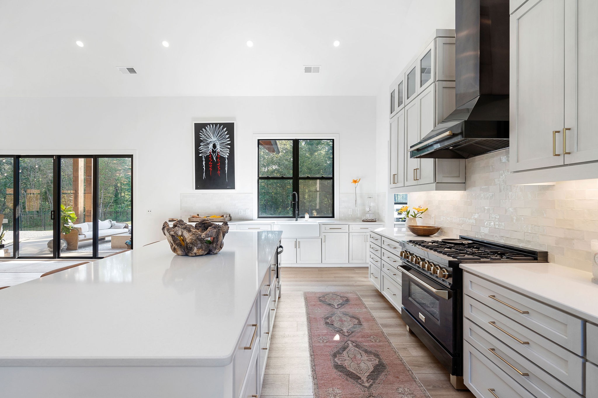 7638 Younger Creek Road Primm Springs, TN 38476 - Photo 37 of 95 a kitchen with stainless steel appliances a stove a sink and a cabinets