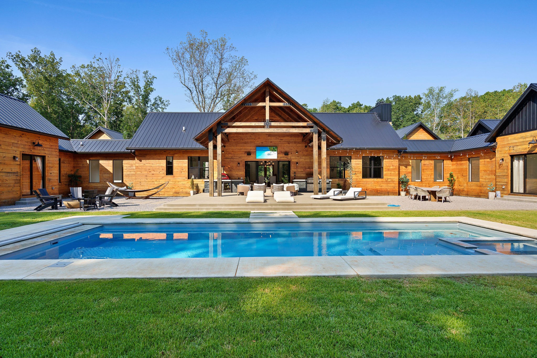 7638 Younger Creek Road Primm Springs, TN 38476 - Photo 59 of 95 a swimming pool view with a seating space and a garden view