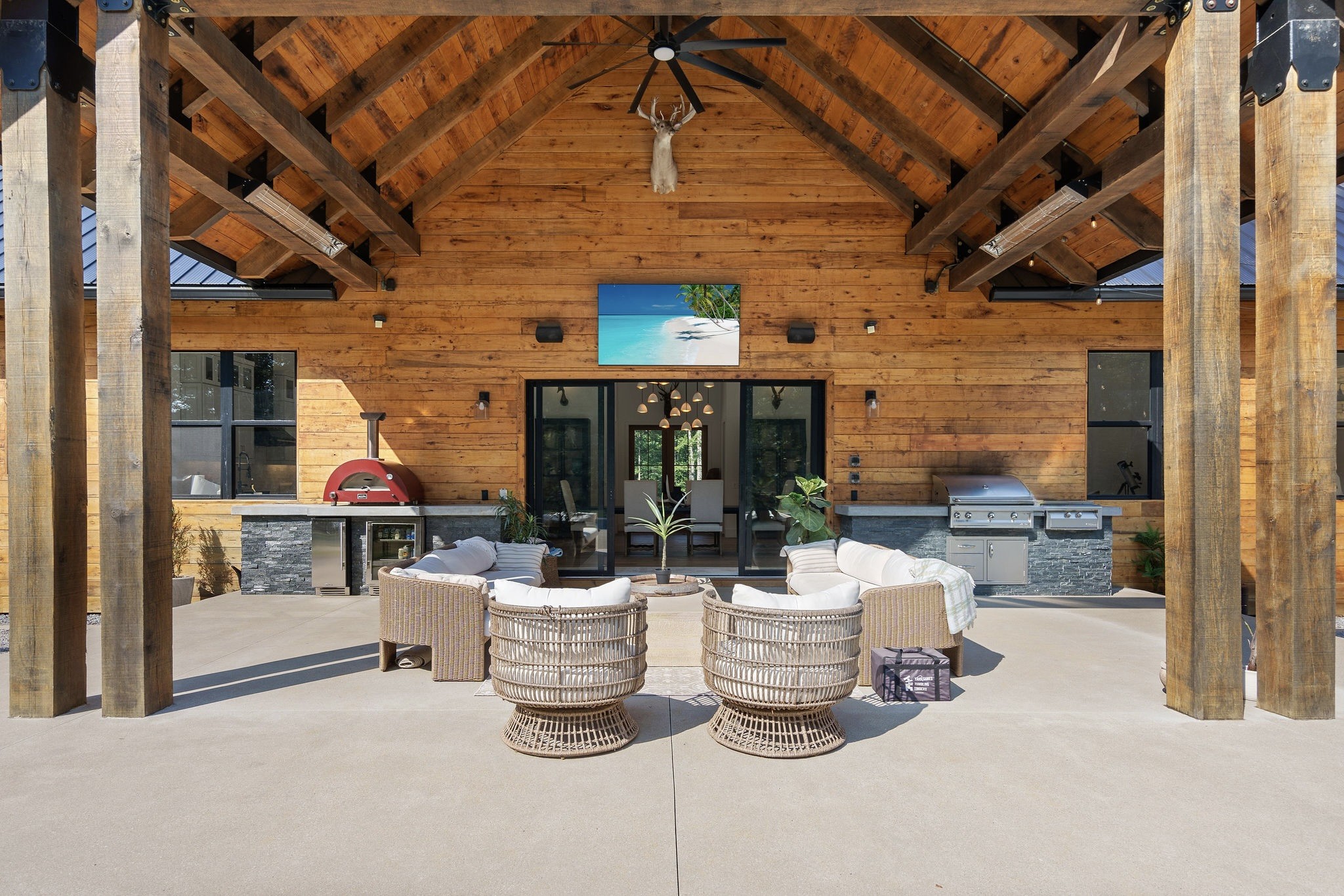 7638 Younger Creek Road Primm Springs, TN 38476 - Photo 6 of 95 a view of a patio with dining table and chairs