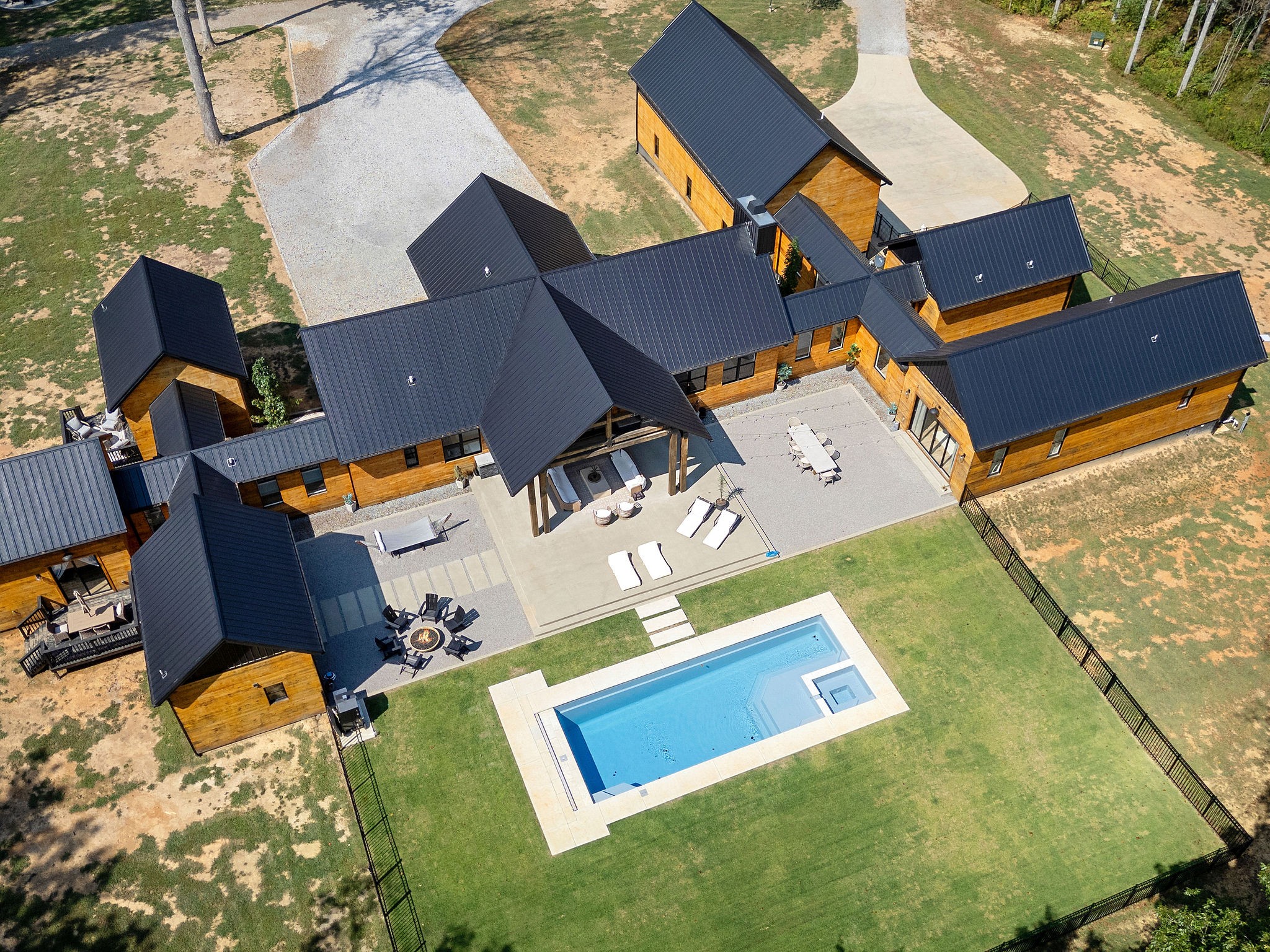 7638 Younger Creek Road Primm Springs, TN 38476 - Photo 64 of 95 an aerial view of residential house with swimming pool