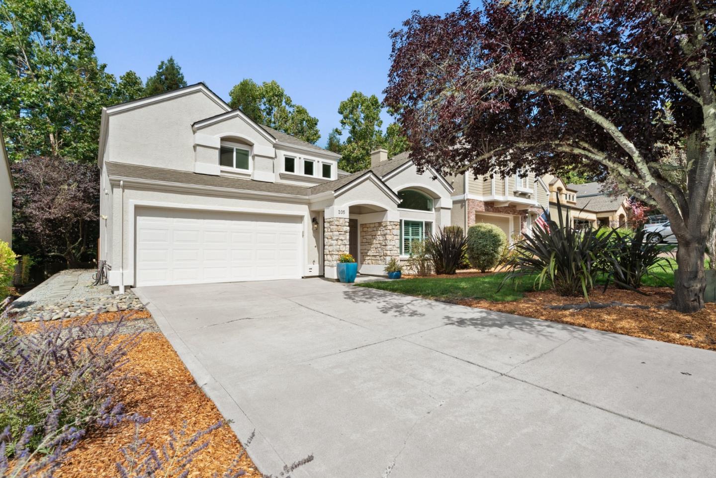 205 Sidesaddle Circle Scotts Valley, CA 95066 - Photo 2 of 57 a front view of a house with a yard and garage