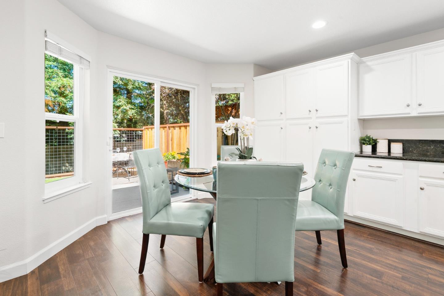 205 Sidesaddle Circle Scotts Valley, CA 95066 - Photo 23 of 57 a living room with furniture a window and wooden floor