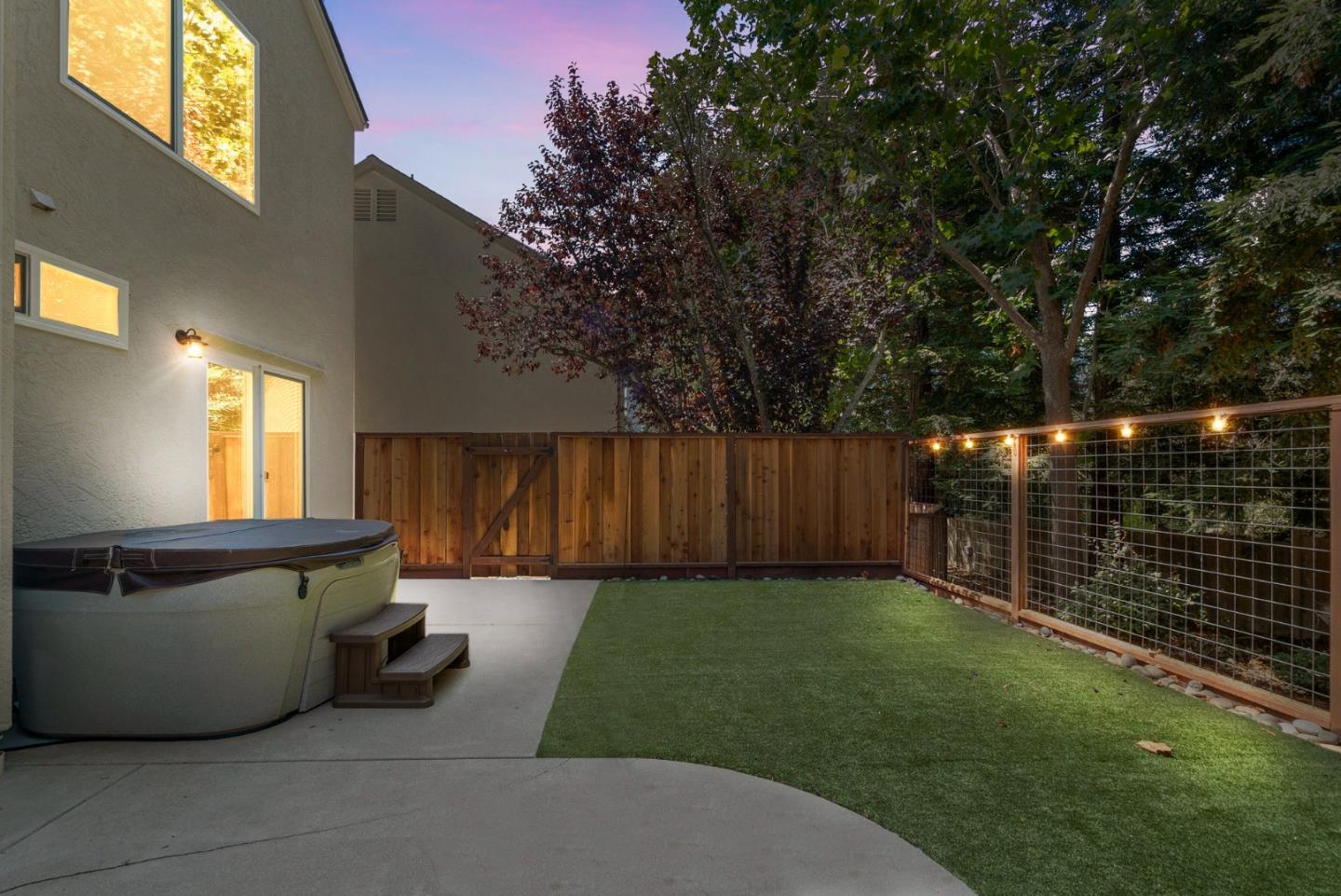 205 Sidesaddle Circle Scotts Valley, CA 95066 - Photo 43 of 57 a view of a backyard with a wooden fence