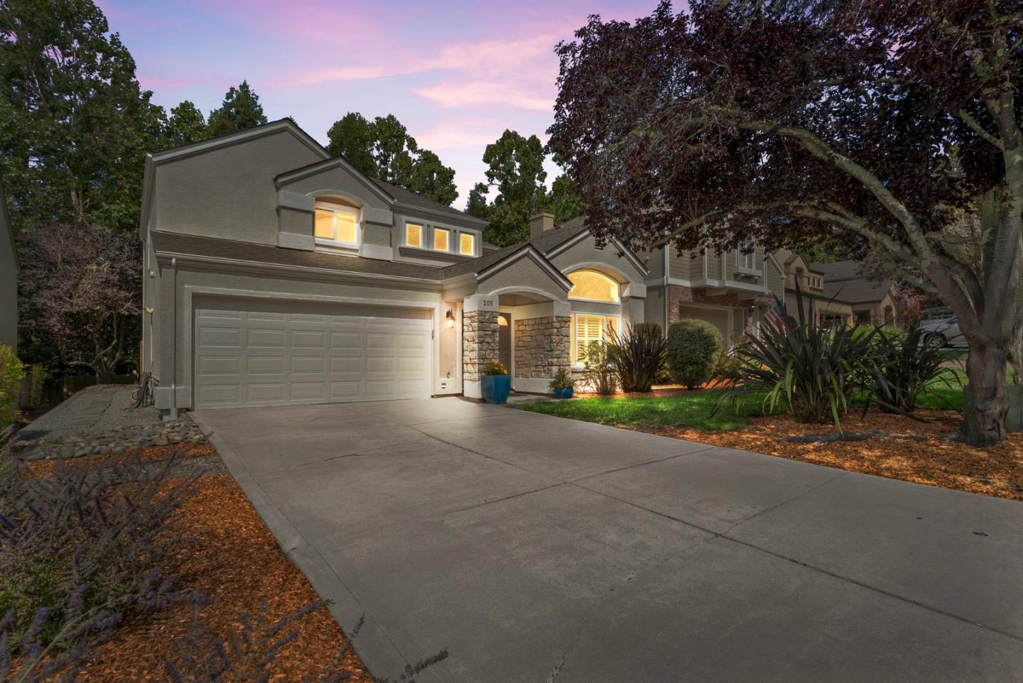 205 Sidesaddle Circle Scotts Valley, CA 95066 - Photo 46 of 57 a front view of a house with a yard and garage