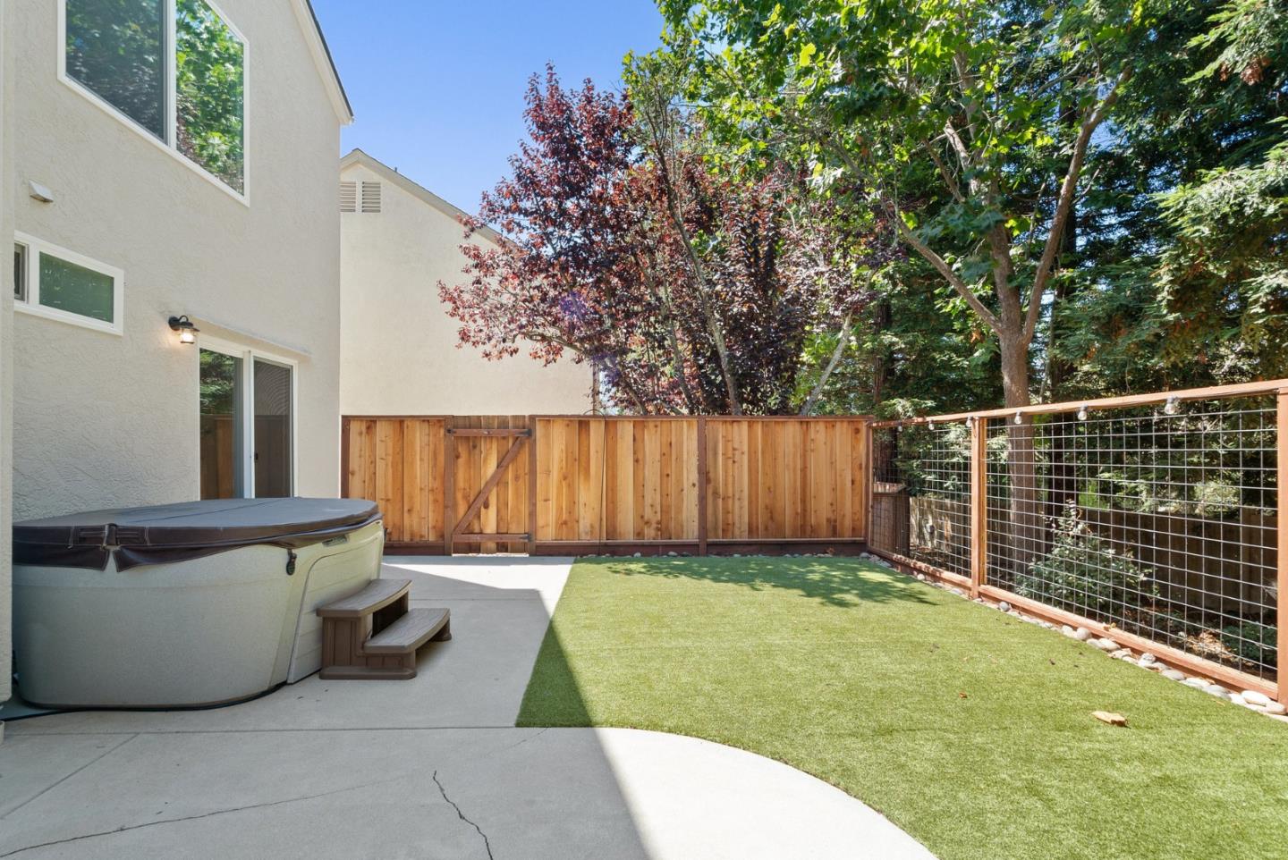 205 Sidesaddle Circle Scotts Valley, CA 95066 - Photo 51 of 57 a view of a backyard with a wooden fence