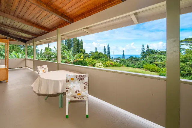 a bathroom with a sink a toilet and shower curtain