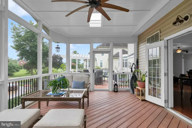 a bathroom with a bathtub sink and mirror