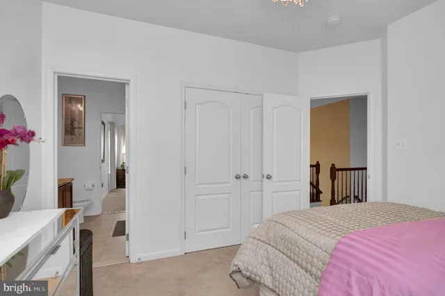 a living room with fireplace furniture and a flat screen tv