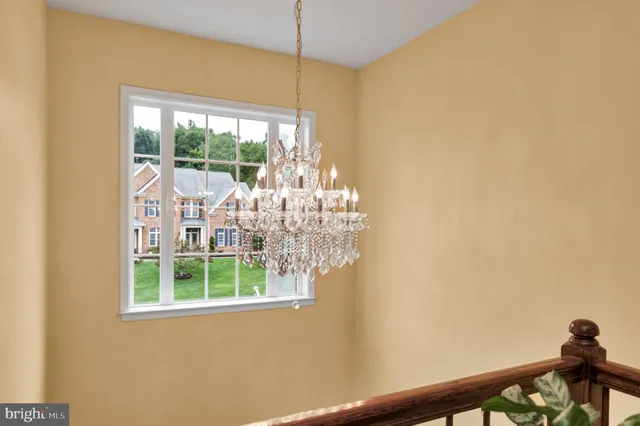 an aerial view of a house with a yard basket ball court and outdoor seating