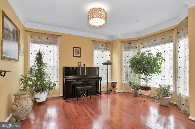 a living room with furniture fireplace and a flat screen tv