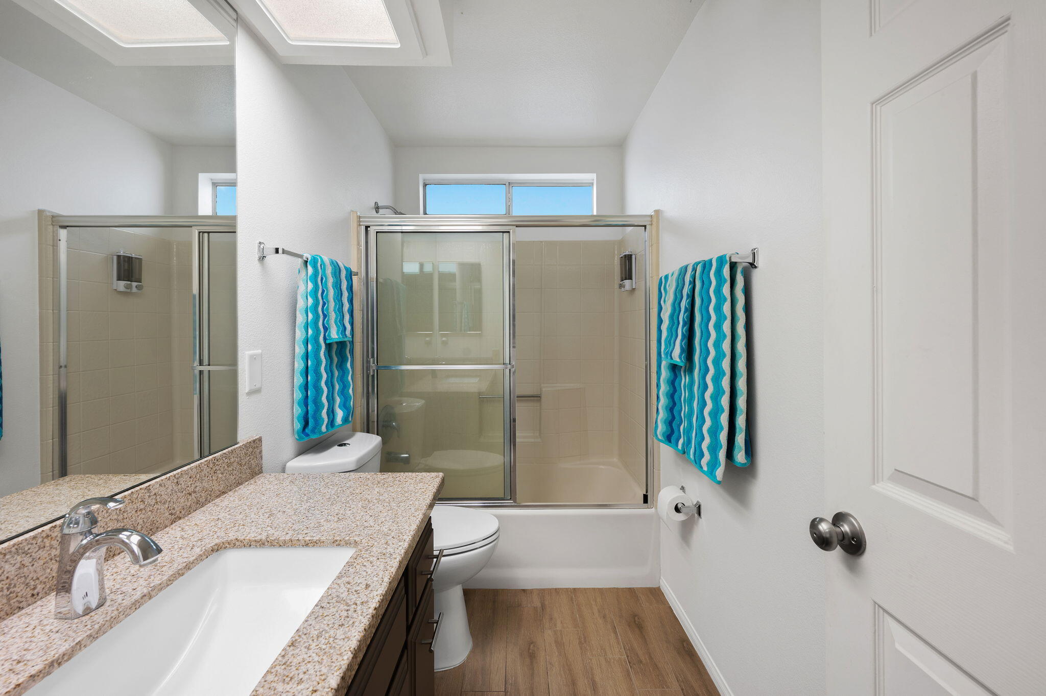 68237 Risueno Road Cathedral City, CA 92234 - Photo 18 of 34 a bathroom with a granite countertop sink toilet and shower