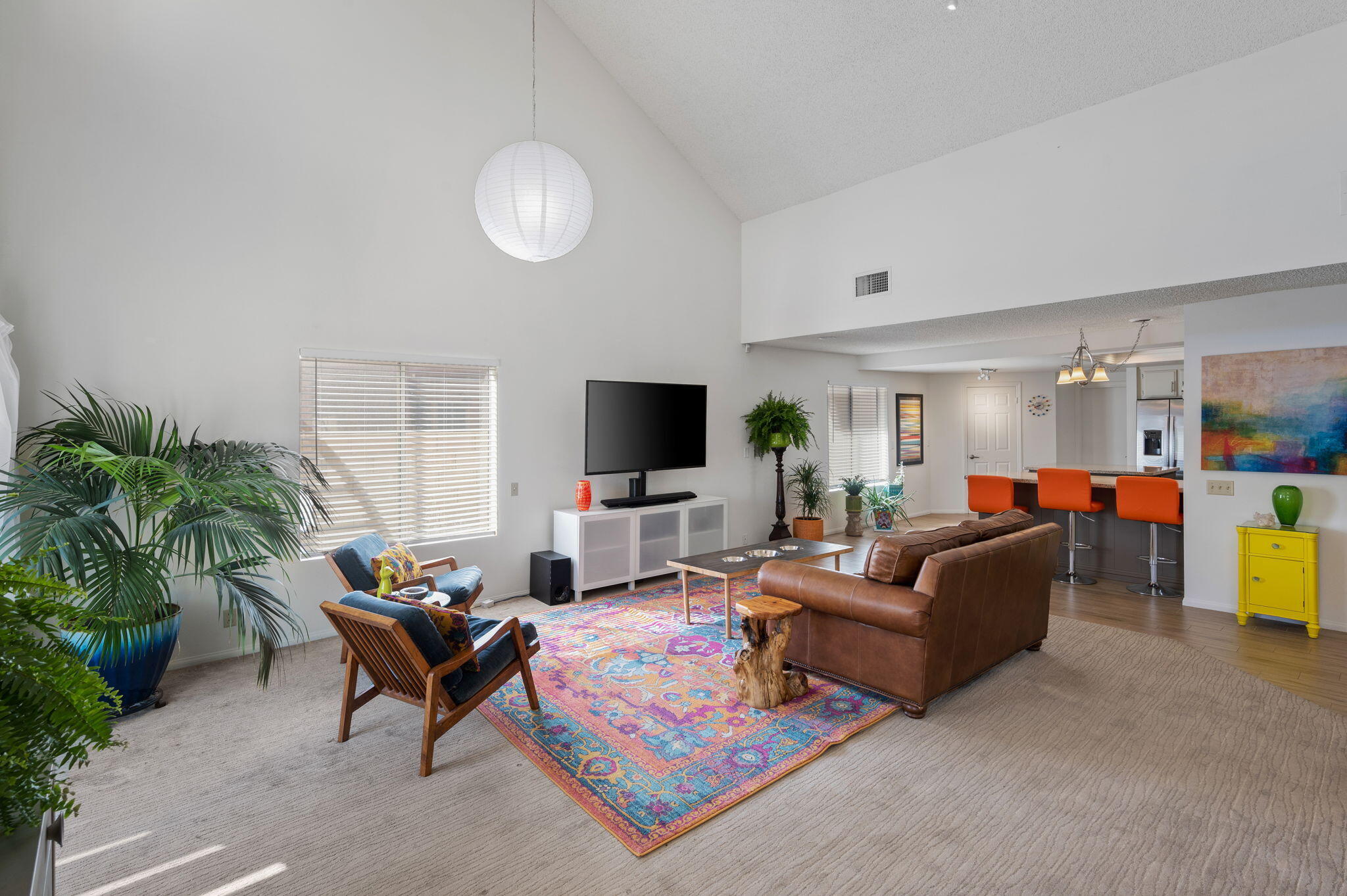 68237 Risueno Road Cathedral City, CA 92234 - Photo 3 of 34 a living room with furniture and a flat screen tv