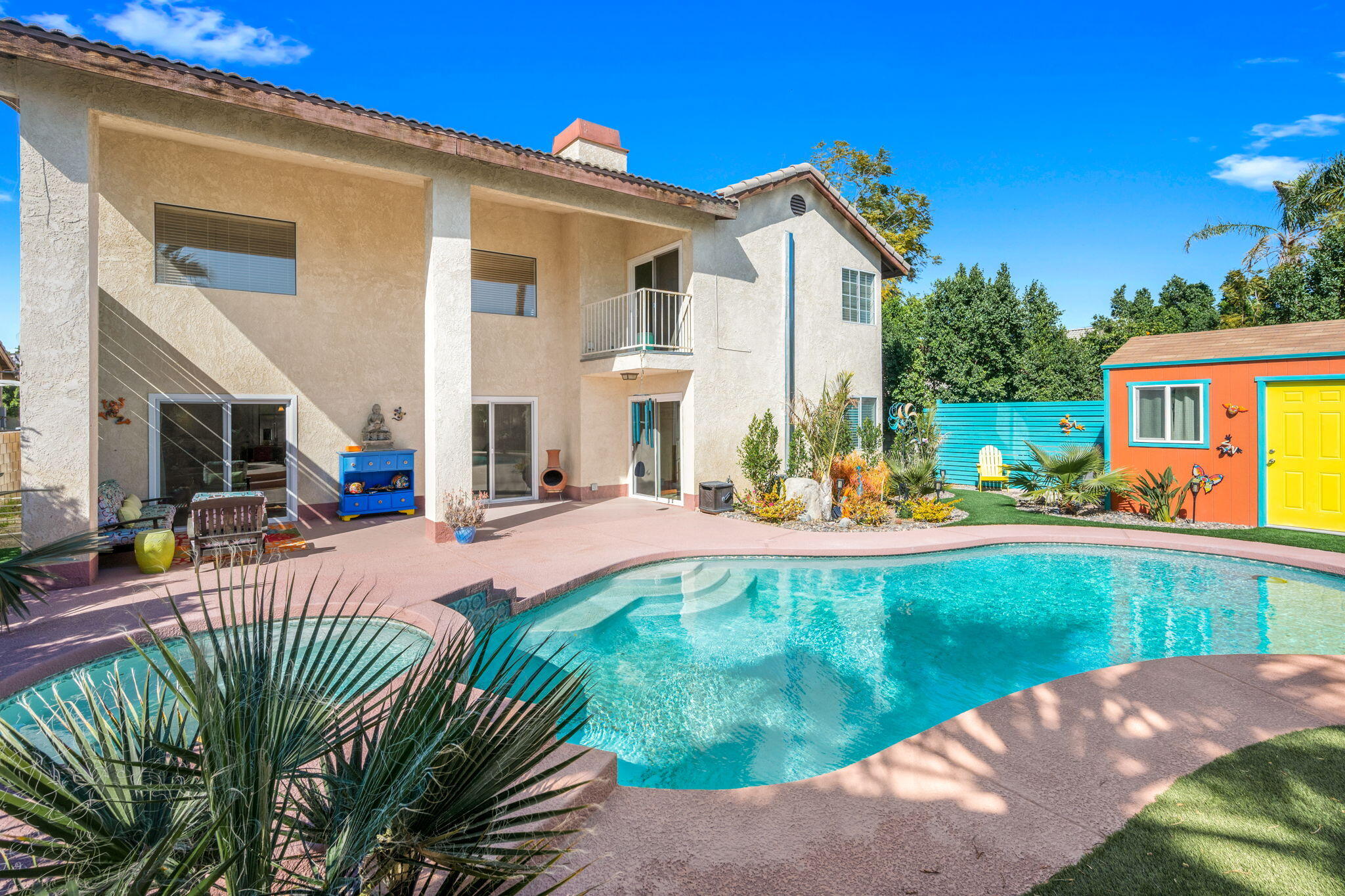 68237 Risueno Road Cathedral City, CA 92234 - Photo 33 of 34 a view of a house with pool and sitting area