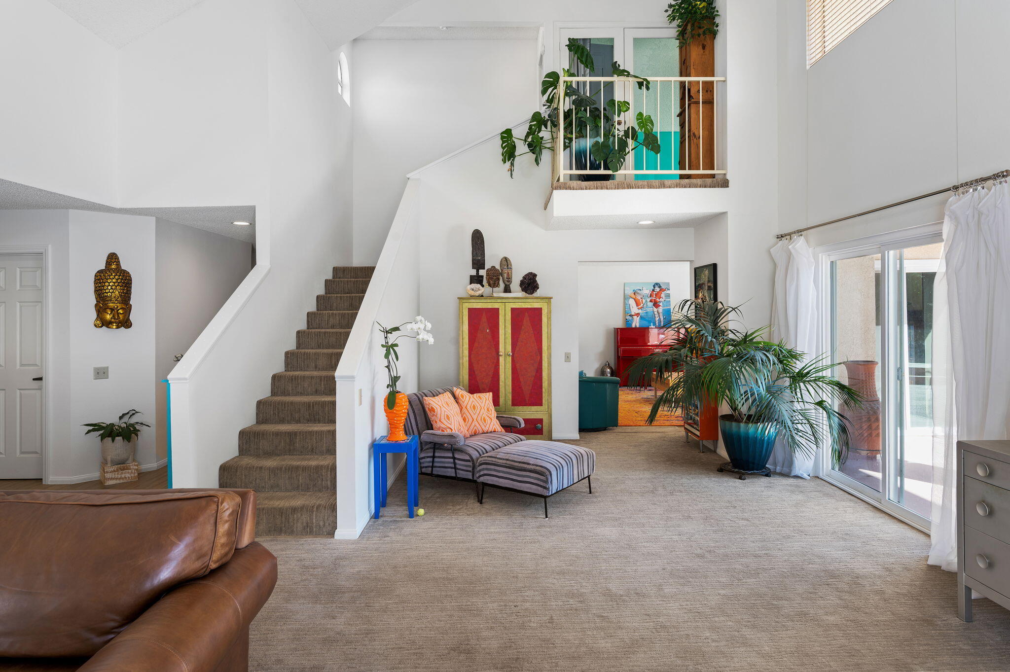 68237 Risueno Road Cathedral City, CA 92234 - Photo 5 of 34 a living room with furniture and a potted plant