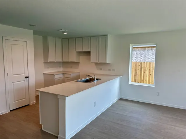 a bathroom with a bathtub sink and toilet