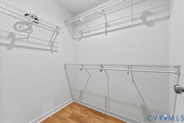 a view of a room with racks on the wall