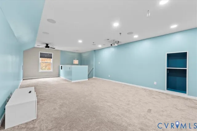 a big room with windows and closet