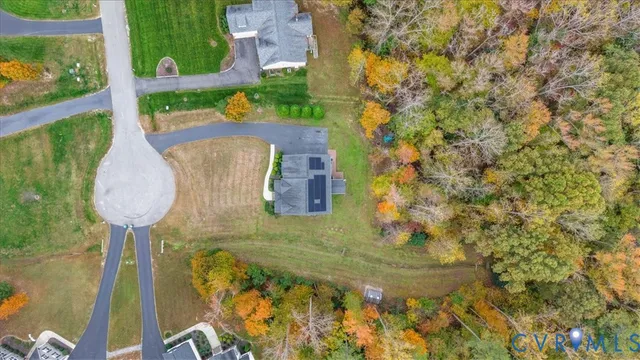 front view of a house with a garden