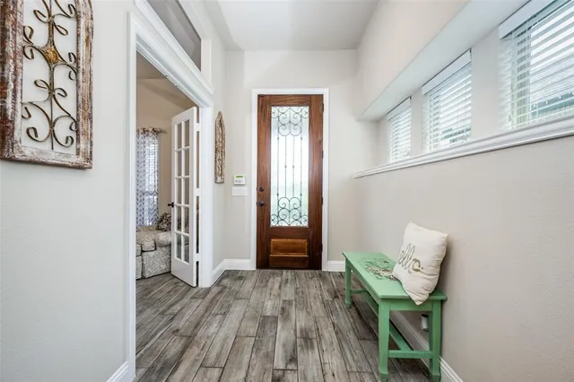 a view of entryway with wooden floor