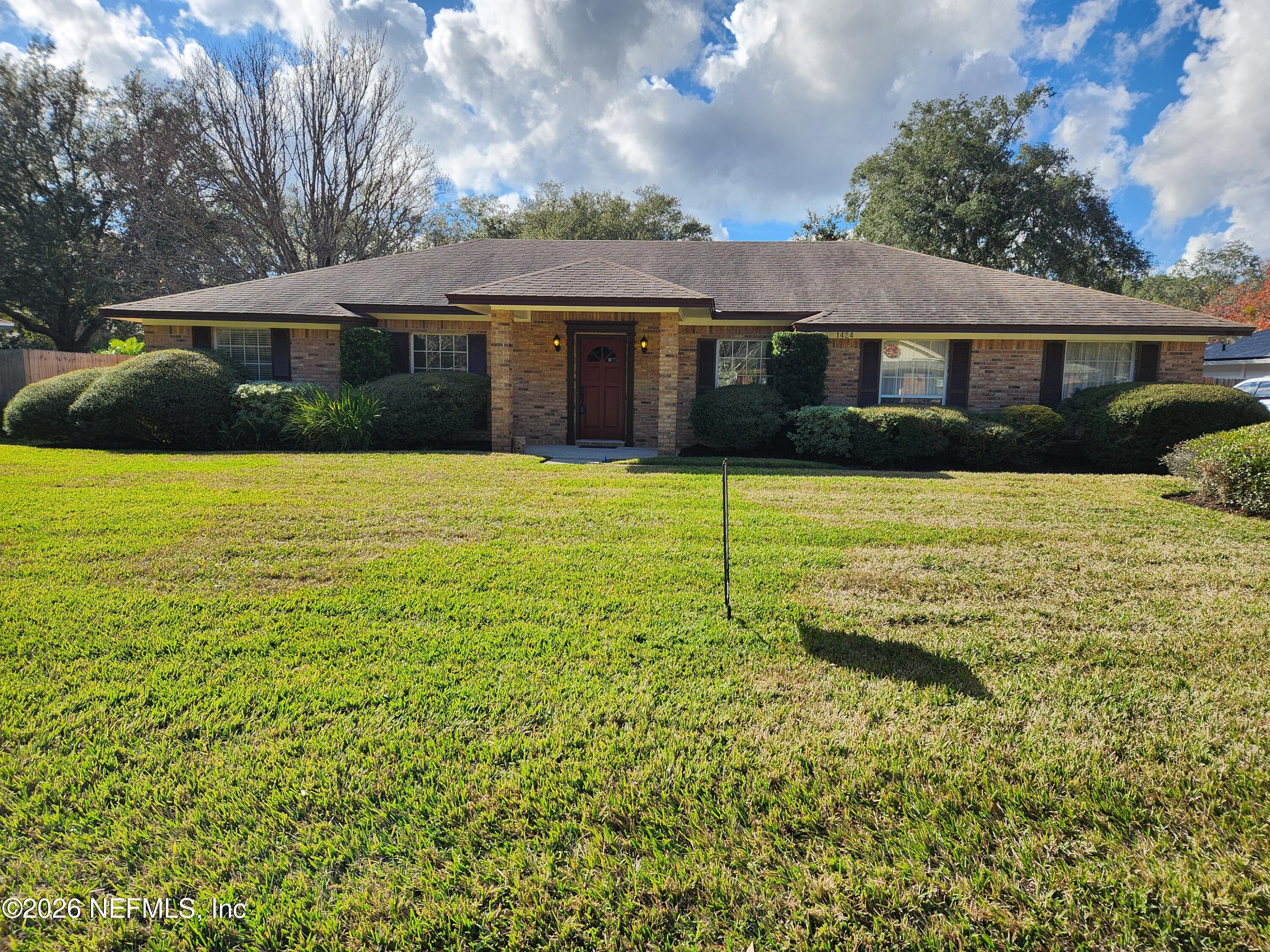 1424 Panther Run Road Jacksonville, FL 32225 - Photo 1 of 36 a front view of a house with a yard