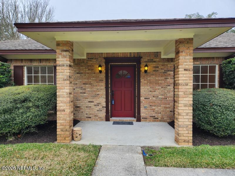 1424 Panther Run Road Jacksonville, FL 32225 - Photo 4 of 36 a front view of a house with entryway