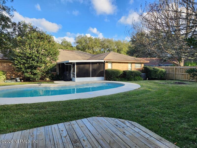 1424 Panther Run Road Jacksonville, FL 32225 - Photo 5 of 36 a view of house with backyard outdoor seating and green space
