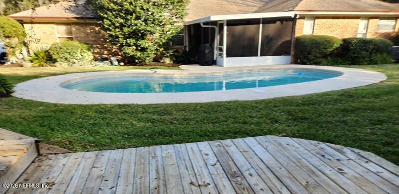 1424 Panther Run Road Jacksonville, FL 32225 - Photo 8 of 36 a view of swimming pool with a yard