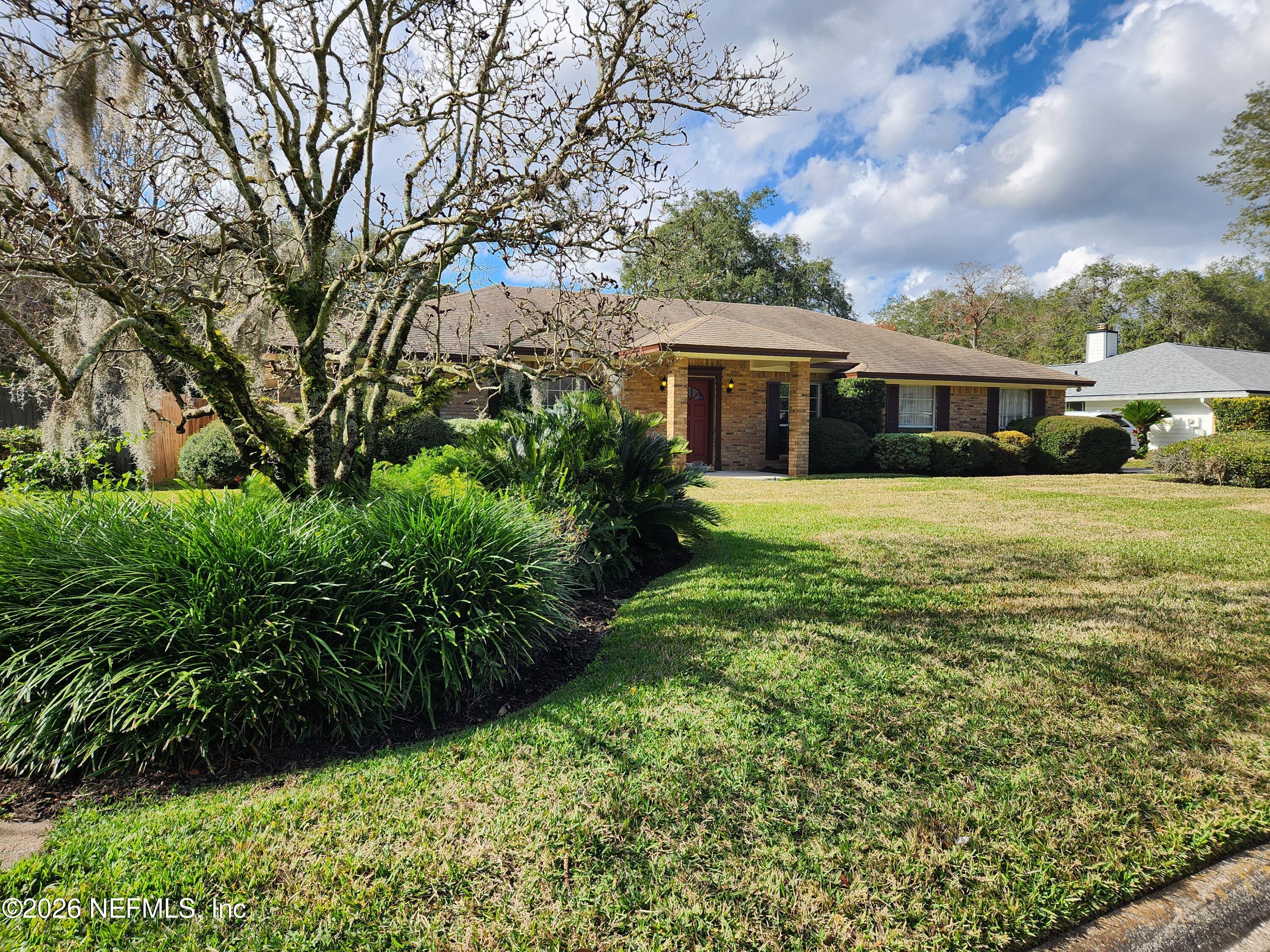 1424 Panther Run Road Jacksonville, FL 32225 - Photo 10 of 36 a front view of house with yard and green space